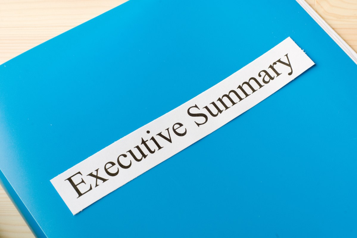 Executive Summary text written on a folder.