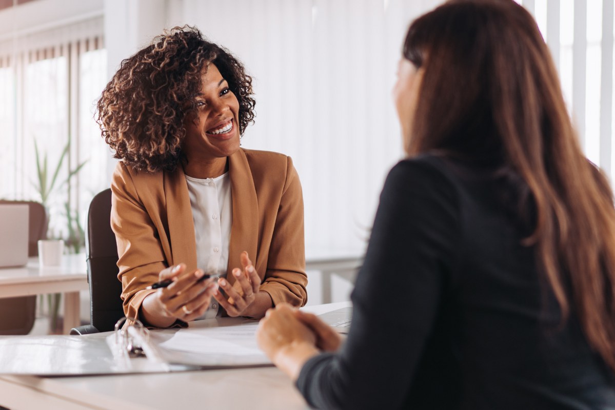 Female consultant talking to client.