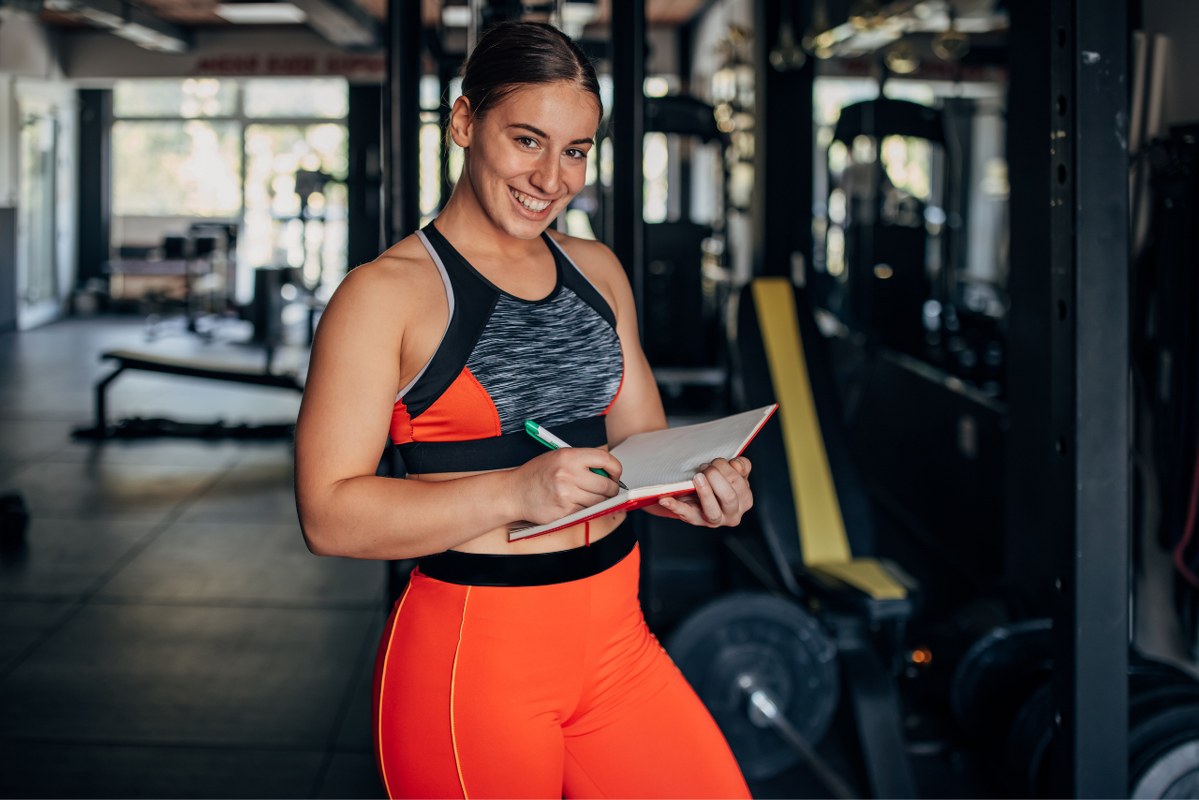 Female fitness trainer at gym.