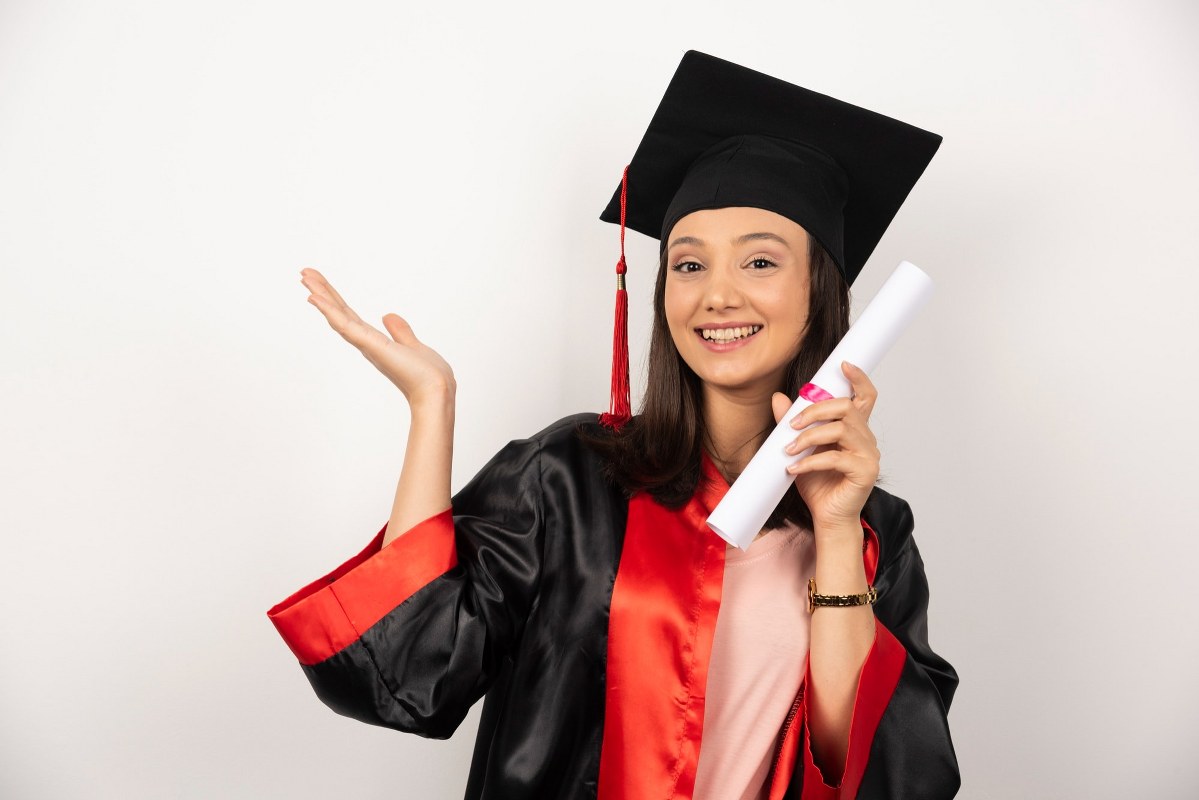 Female with diploma.