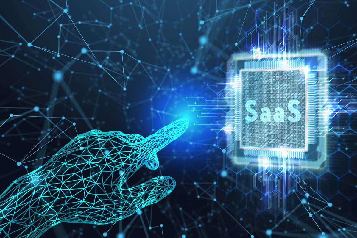 Futuristic hand about to touch SAAS microchip.