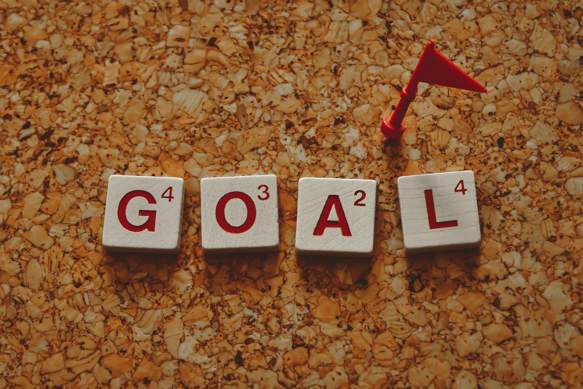Goal Text formed from scrabble tiles.