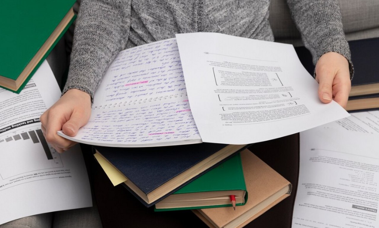Going through hardcopy research papers that can be digitized.