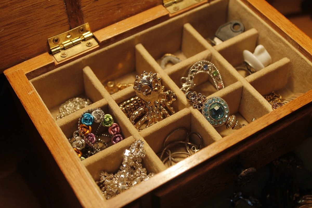 Jewelry and ornaments inside a box.