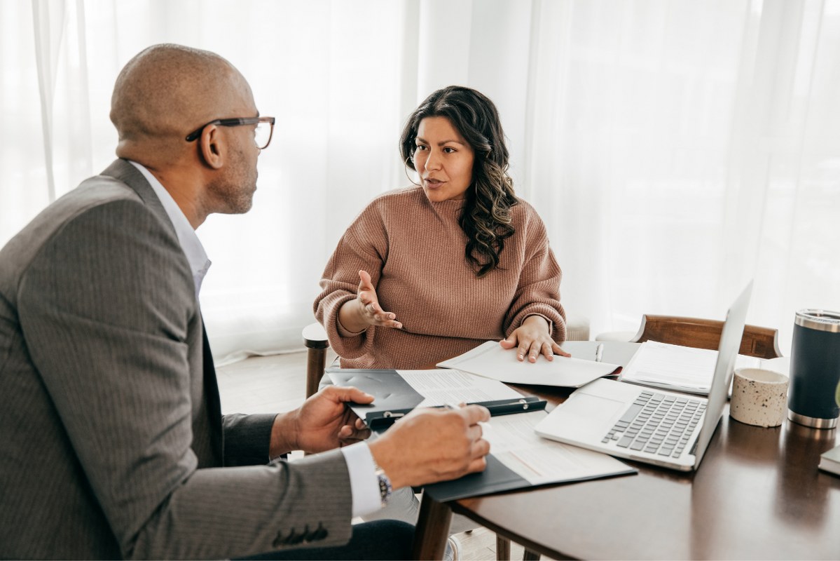 Male tax advisor with a female client.