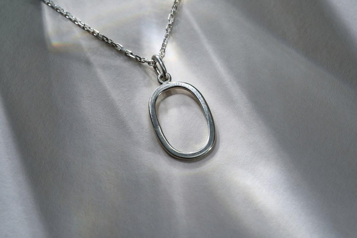 Neck accessory made from sterling silver.