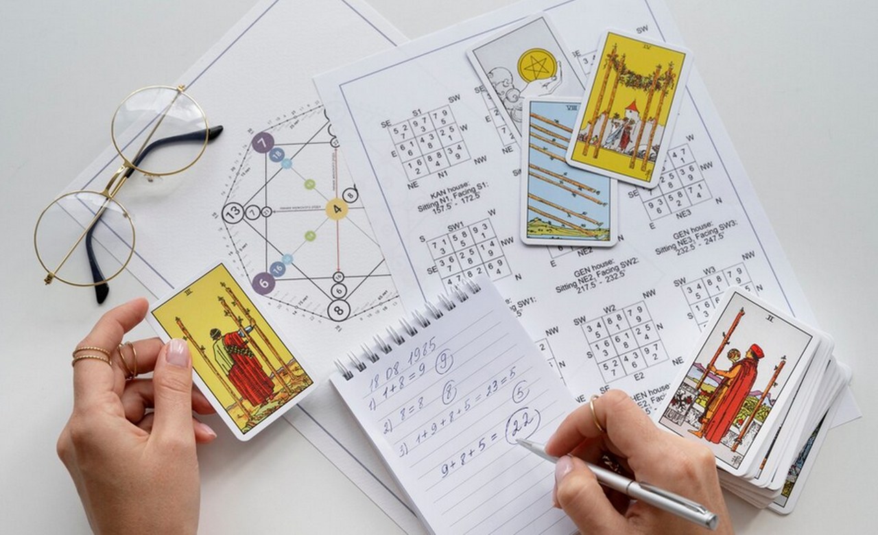 Note-taking during tarot reading.