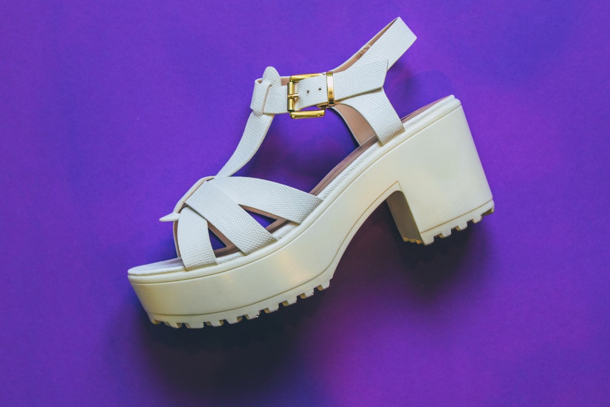 One Platform Sandal on a violet background.