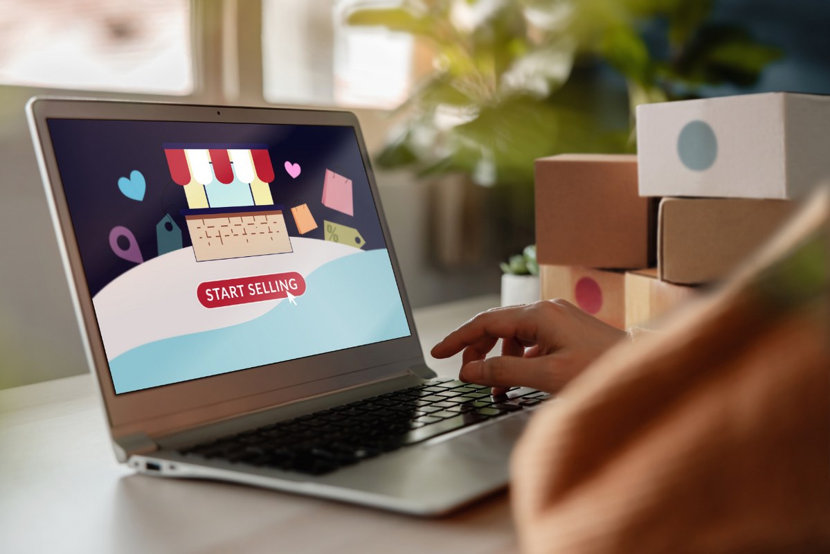 Person clicks on a web store site to start online reselling.