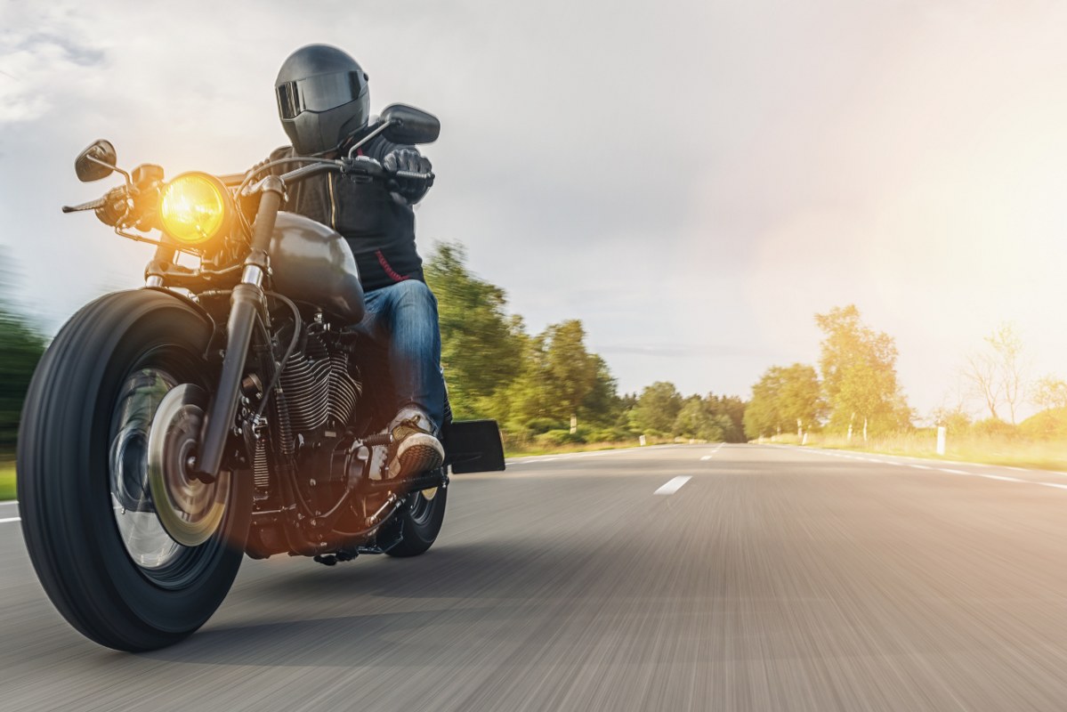 Person doing a motorcycle test drive.