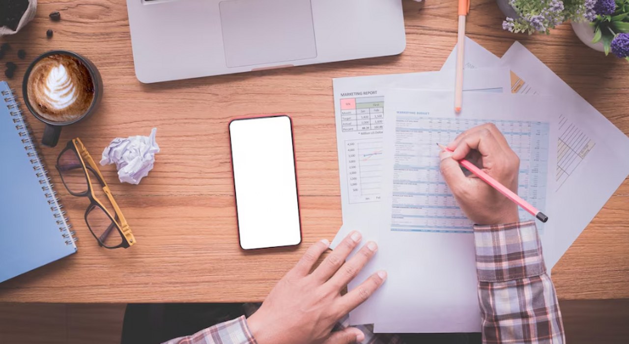 Printed notes with tables.
