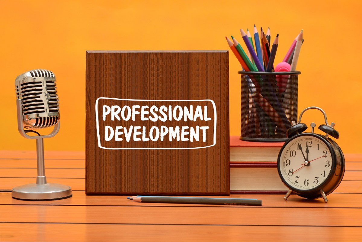 Professional development theme, Stationery items and microphone.