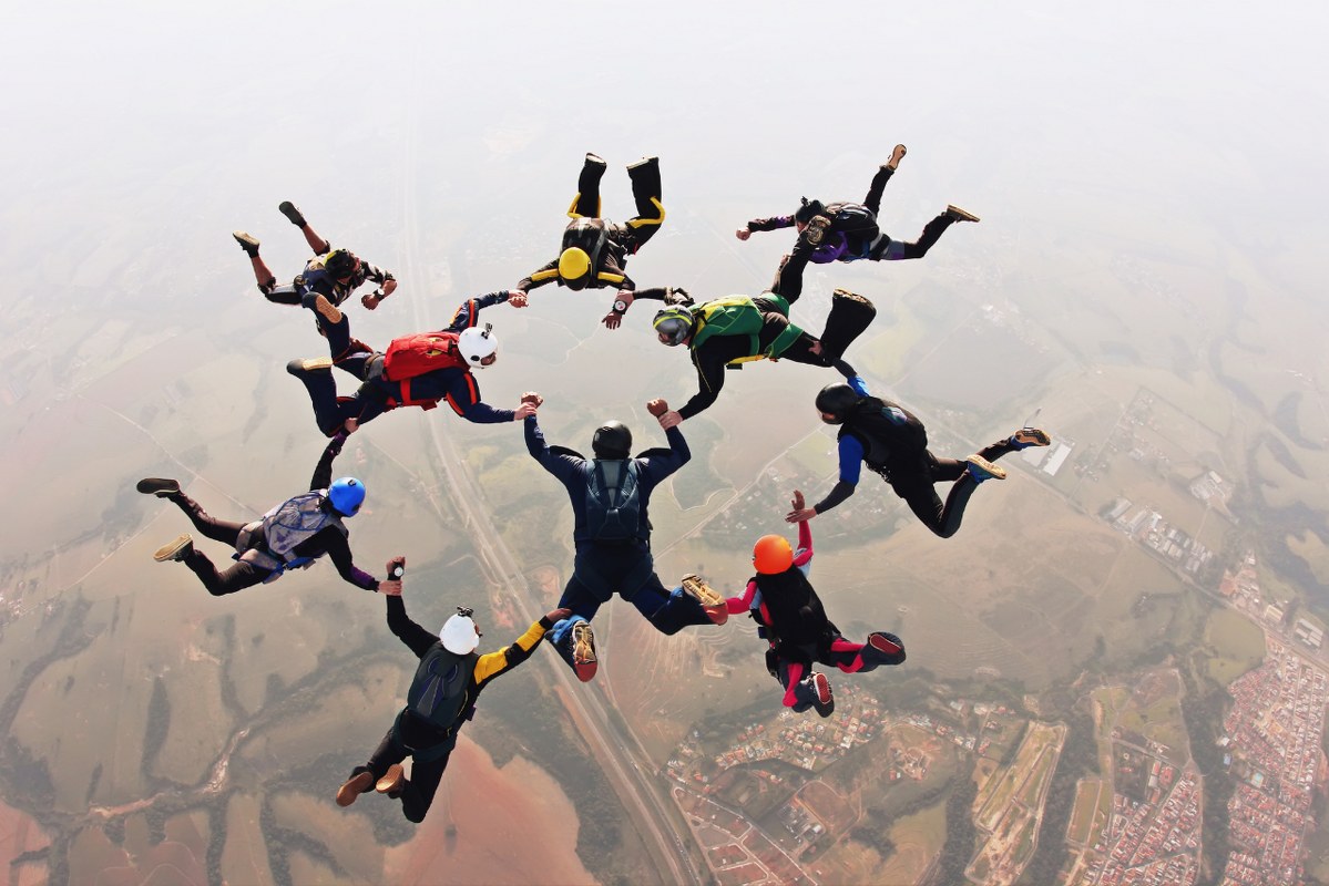 Skydive team making a formation.