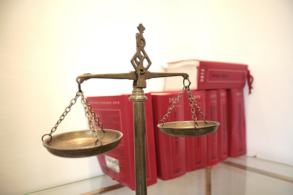 The weighing balance as a symbol of justice.
