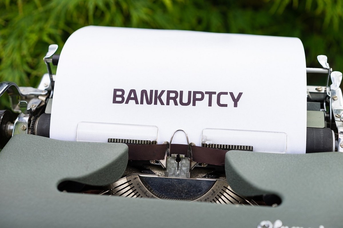 The word 'bankruptcy' typed by a typewriter.