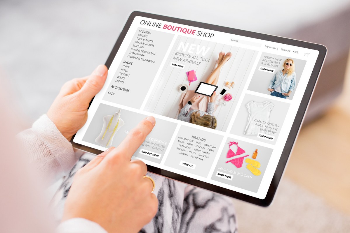 Woman Shopping Online at Boutique Fashion Store.