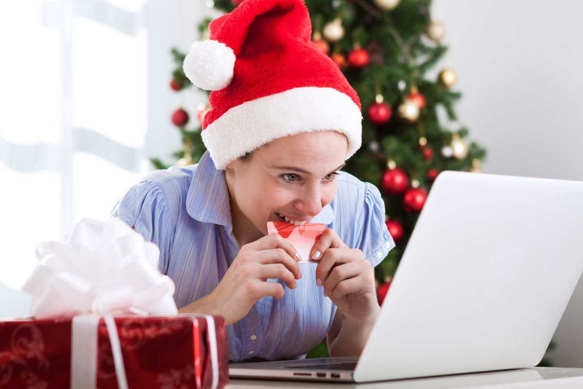 Woman does online shopping before christmas.
