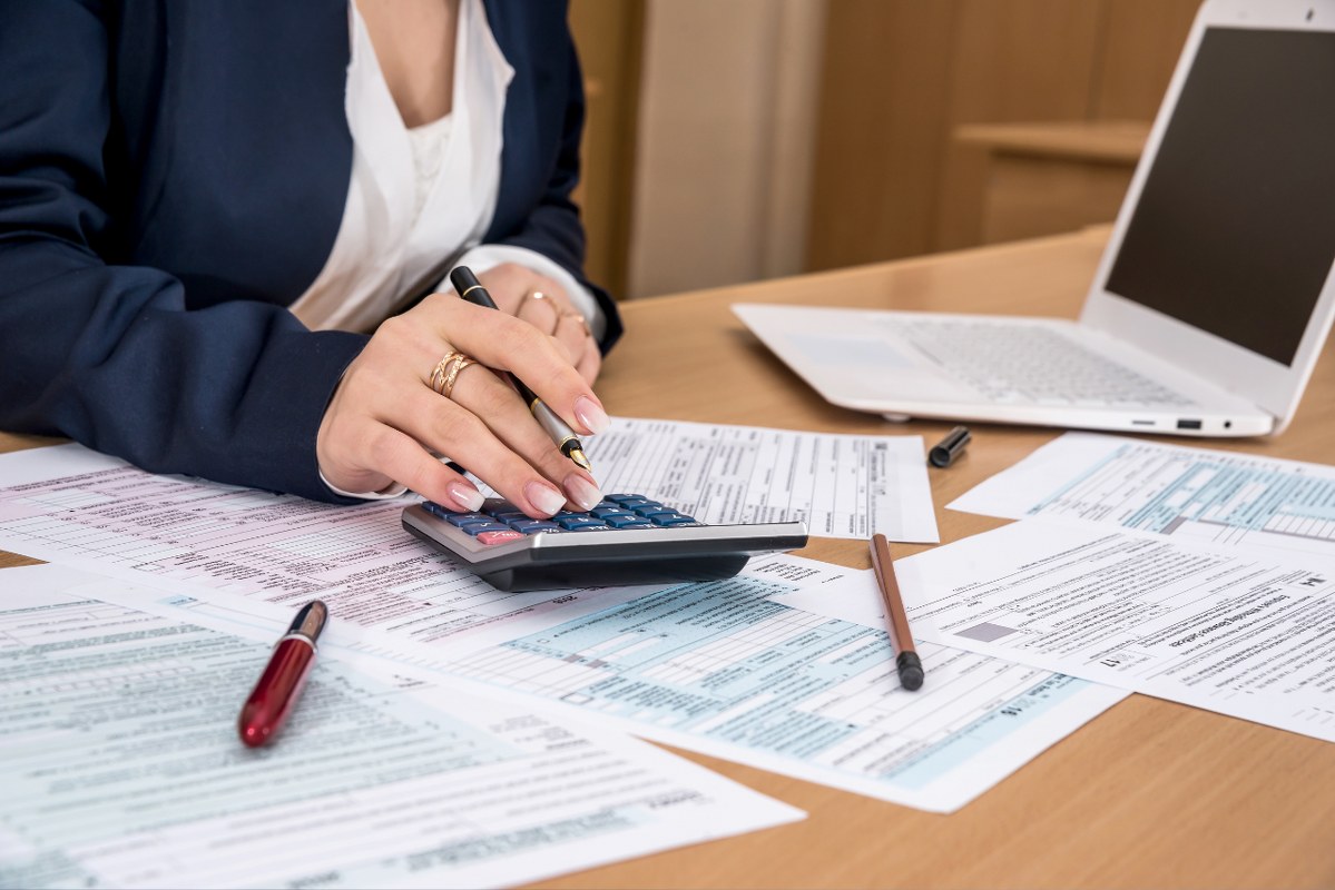 Woman filling US tax form.