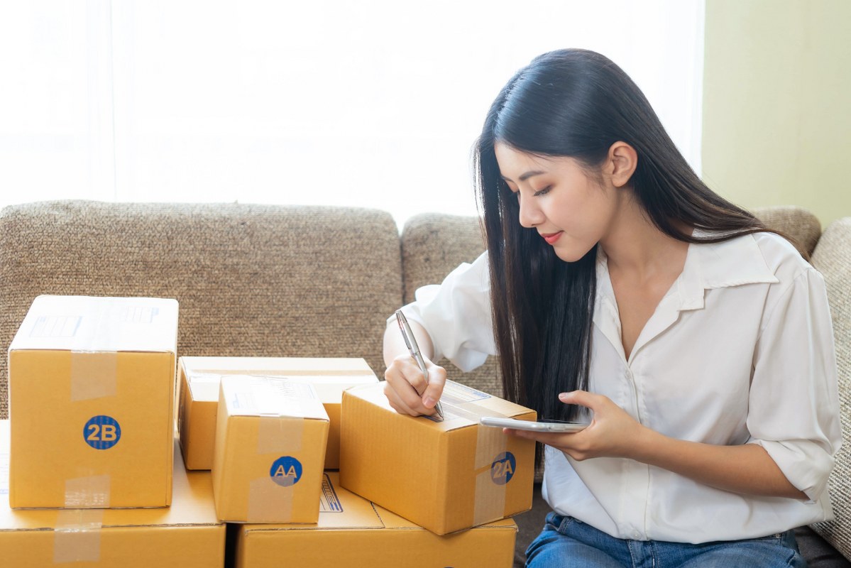 Woman fulfilling Orders from online store.