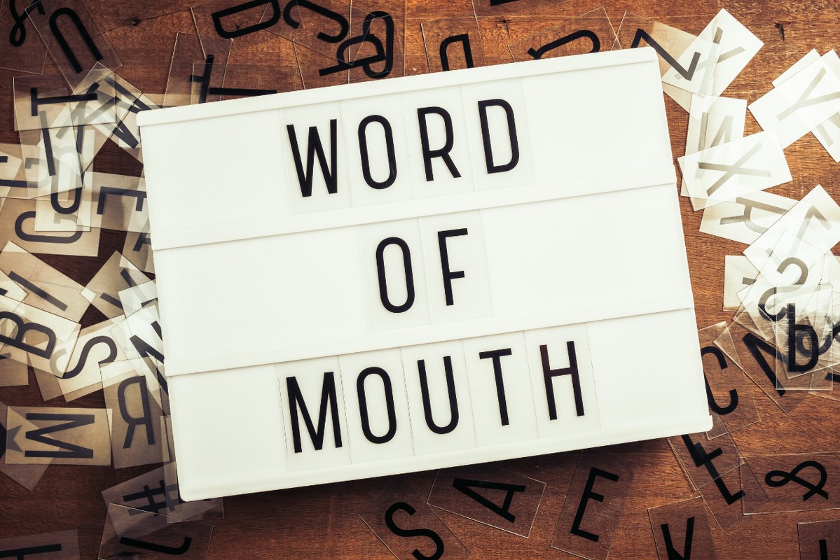 Word of Mouth words on lightbox.