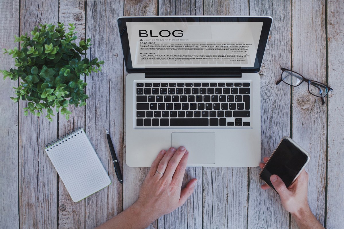 Writing a blog, blogger influencer reading text on screen.