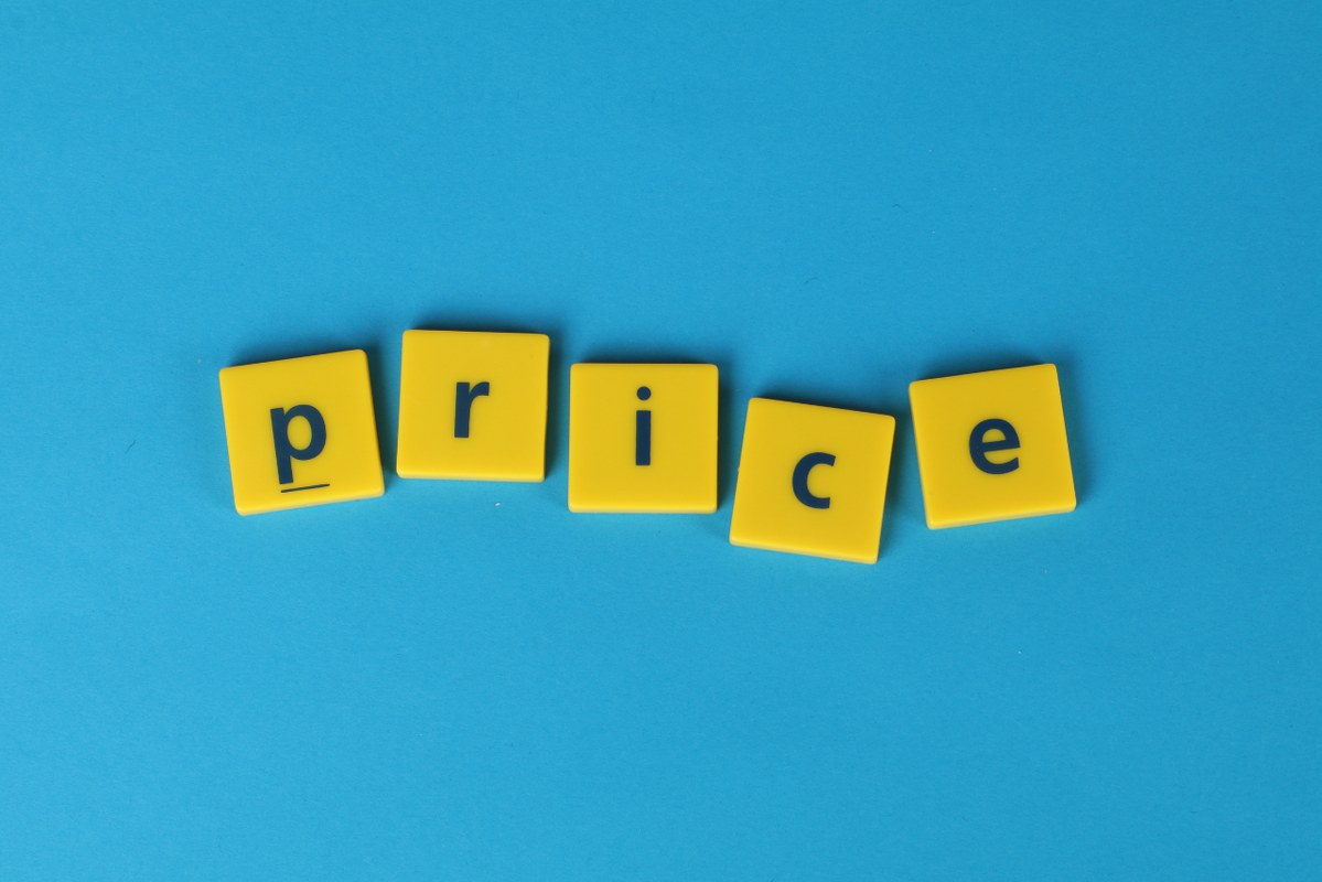 Yellow Scrabble Tiles forming word price.