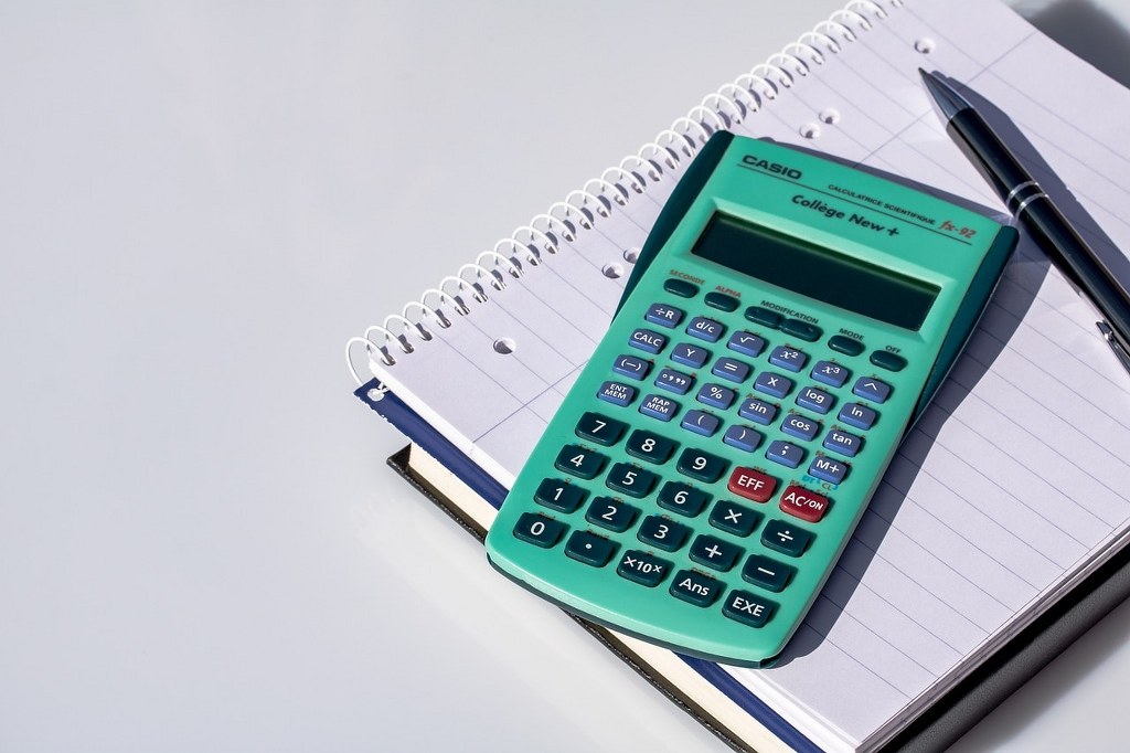 A calculator and a notebook.