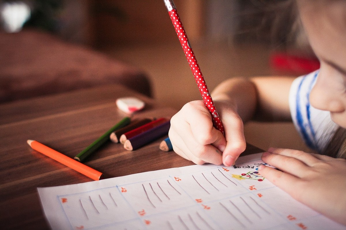 A child writing.