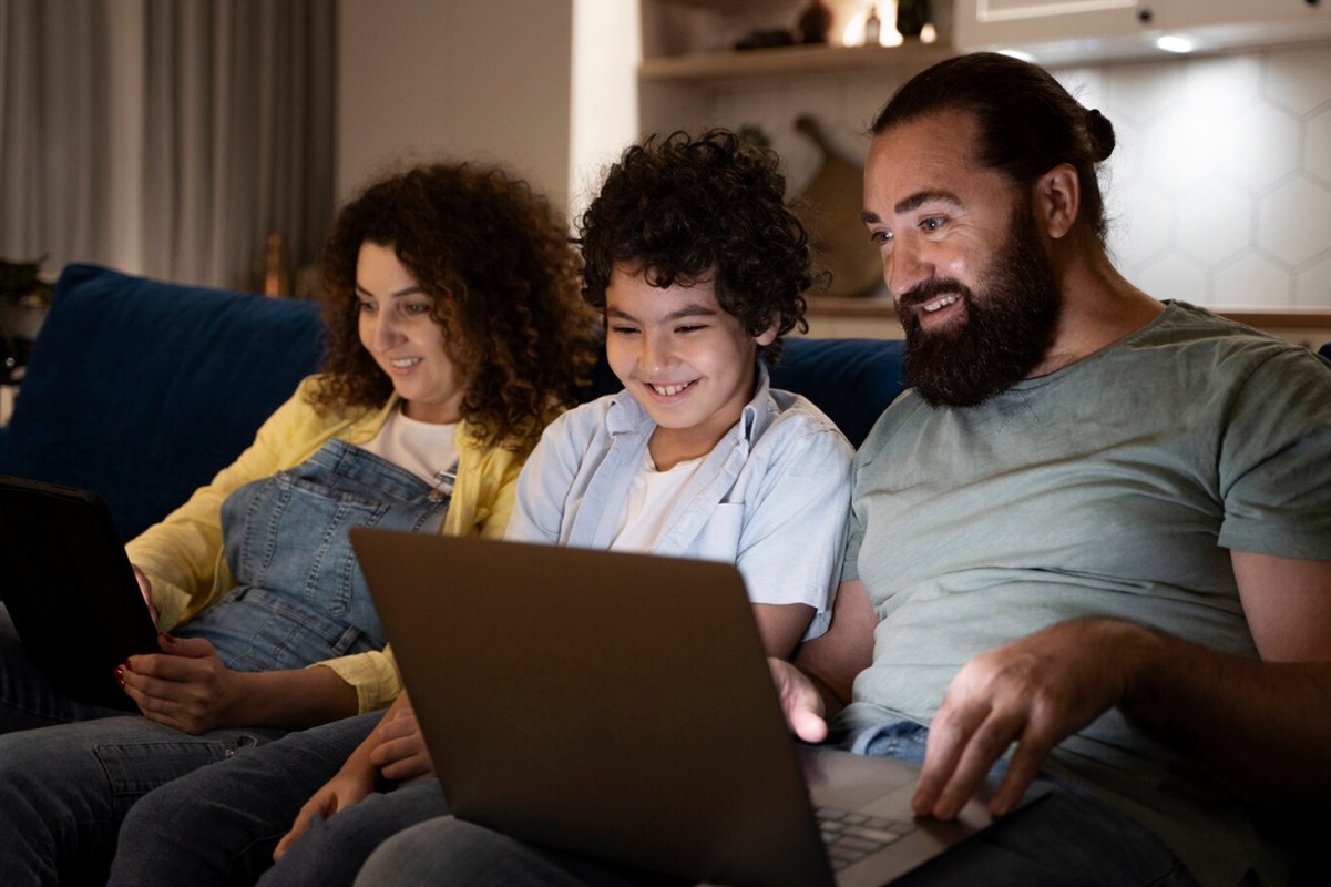 A family consuming online content.
