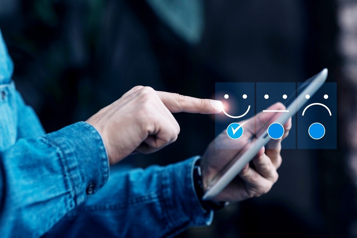 A man leaves positive reviews on their mobile phones.