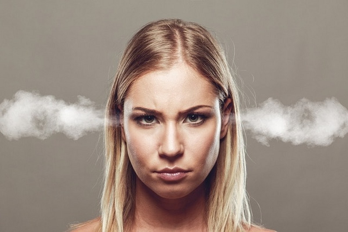 A woman is frustrated with the problem that repeats.