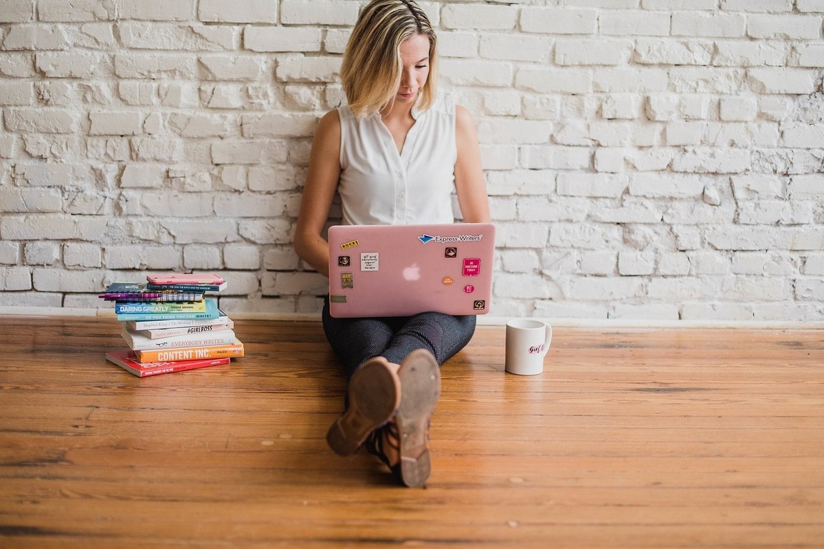 A woman using her laptop computer.
