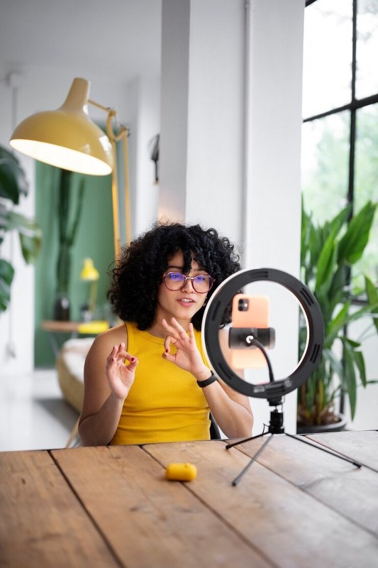 A woman with ring light.