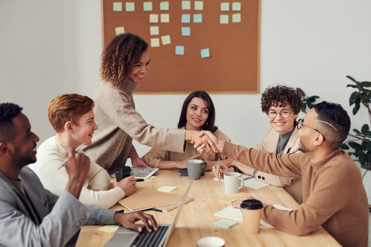 Business partners shaking each other's hands.