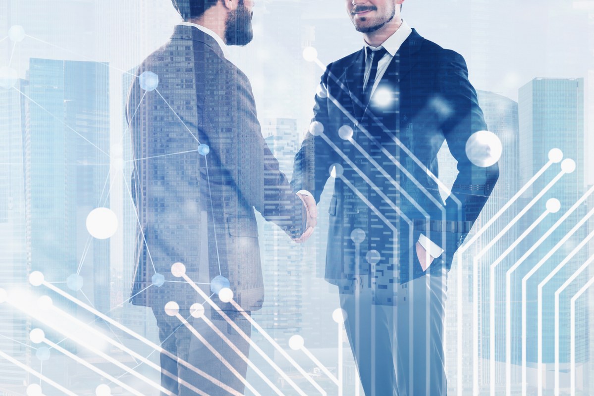 Business people shaking hands.