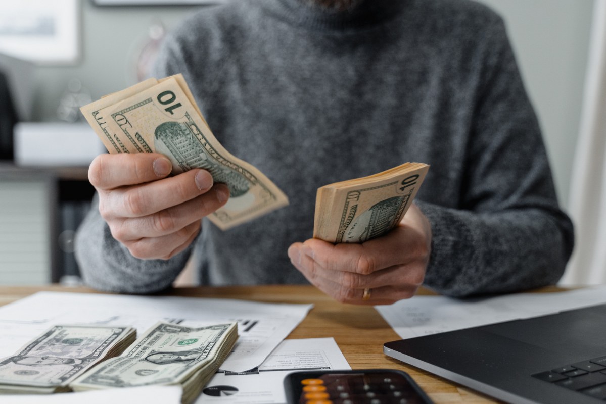 Business person counting money.