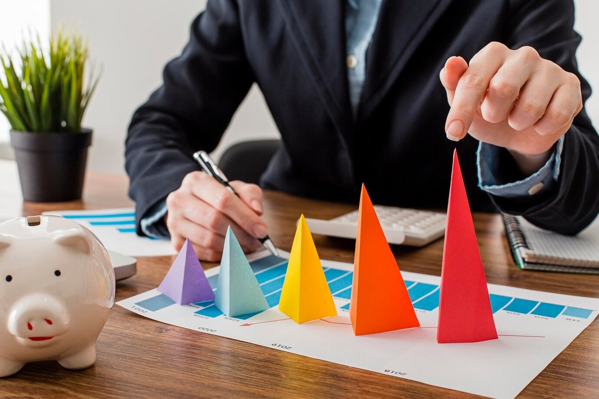 Businessman with colorful cones.