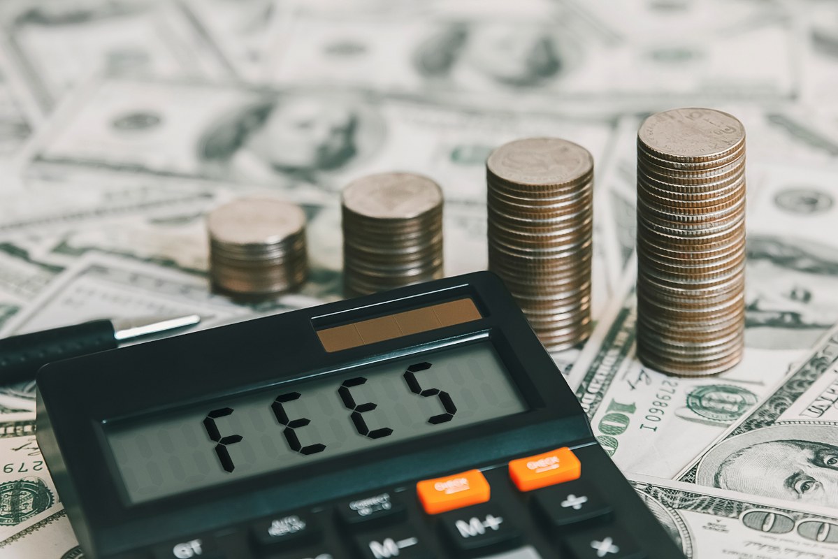 Calculator with word FEES displayed.