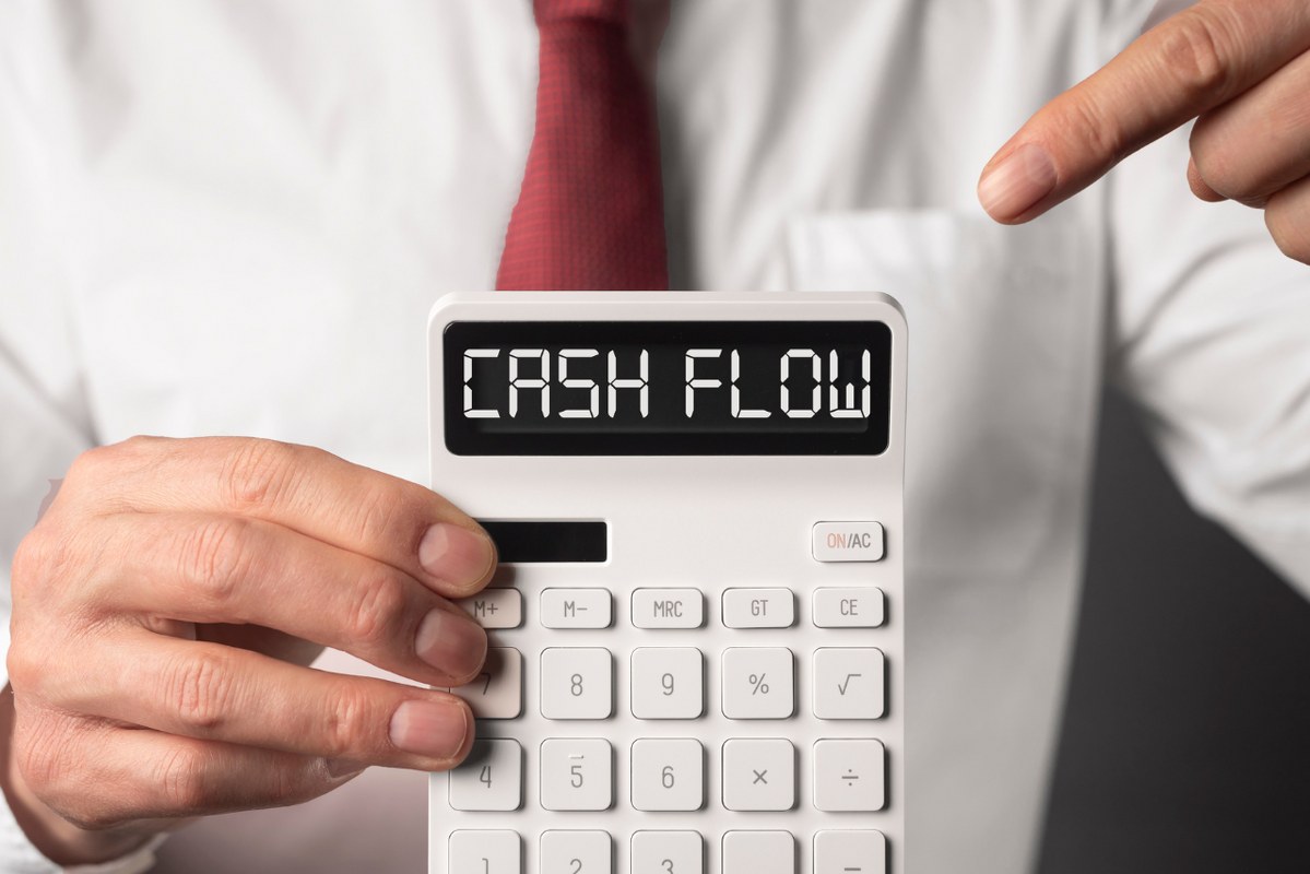 Cash flow word on calculator, cashflow inscription.