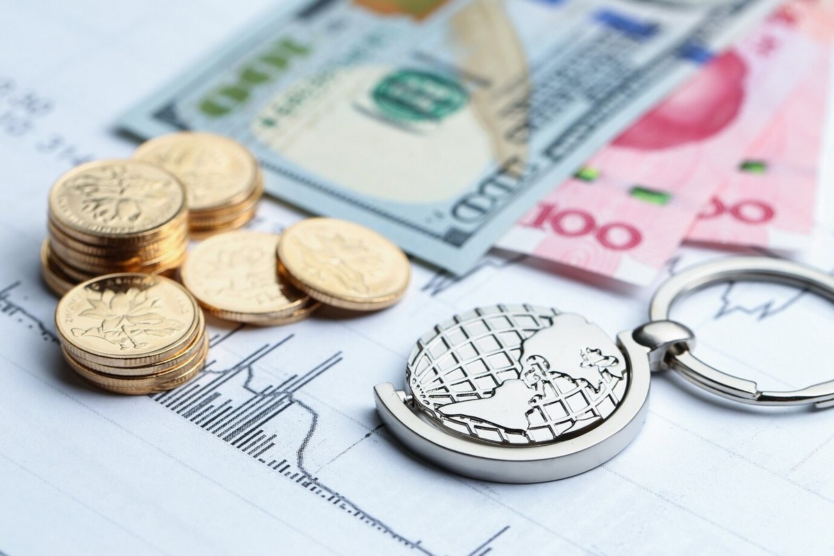 Coins, paper money and globe.
