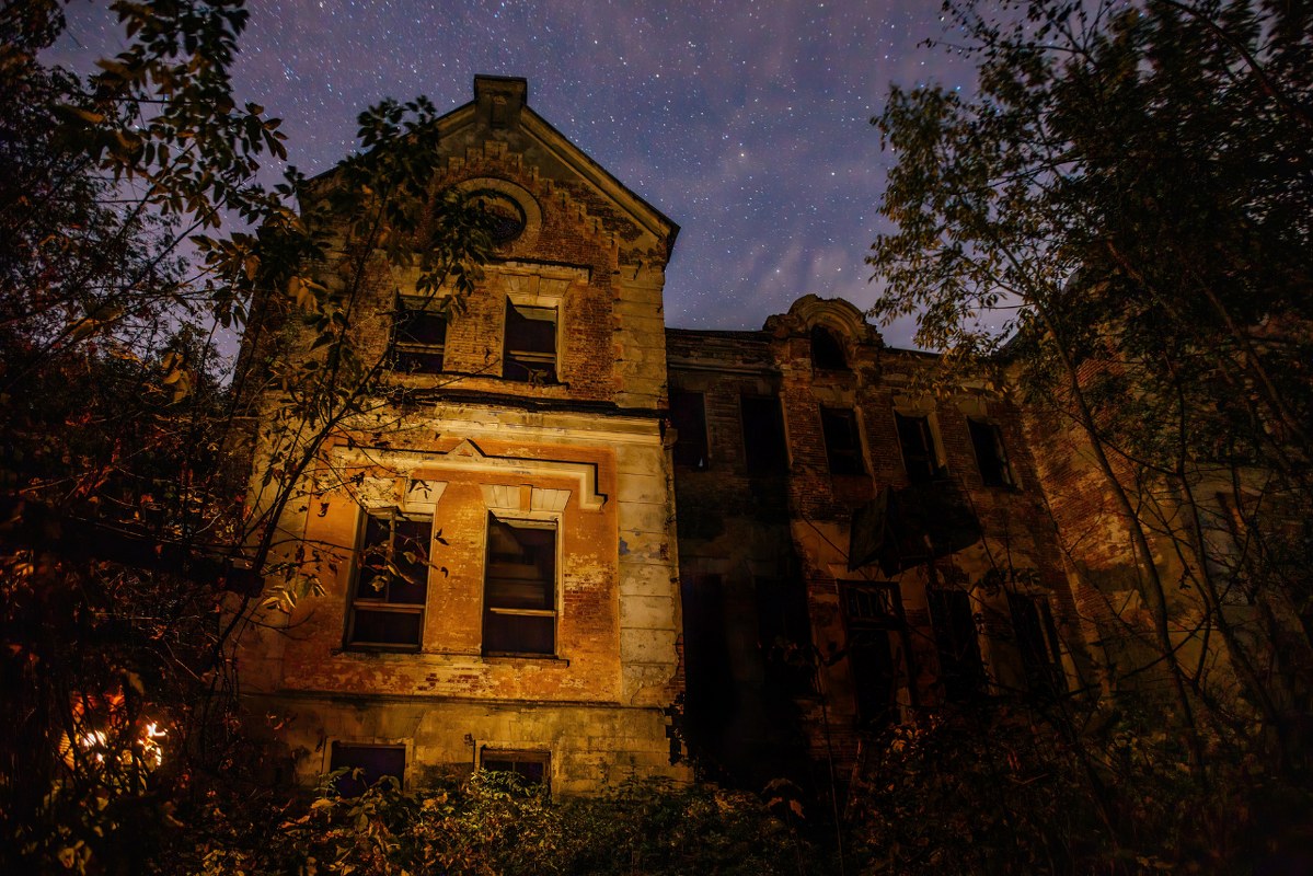 Dark and creepy old abandoned haunted house.