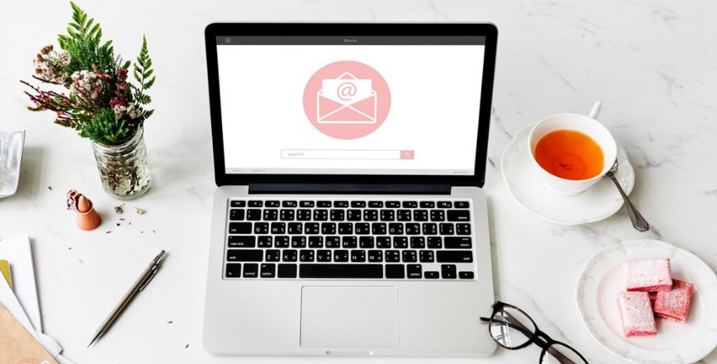 Email logo on a computer screen.