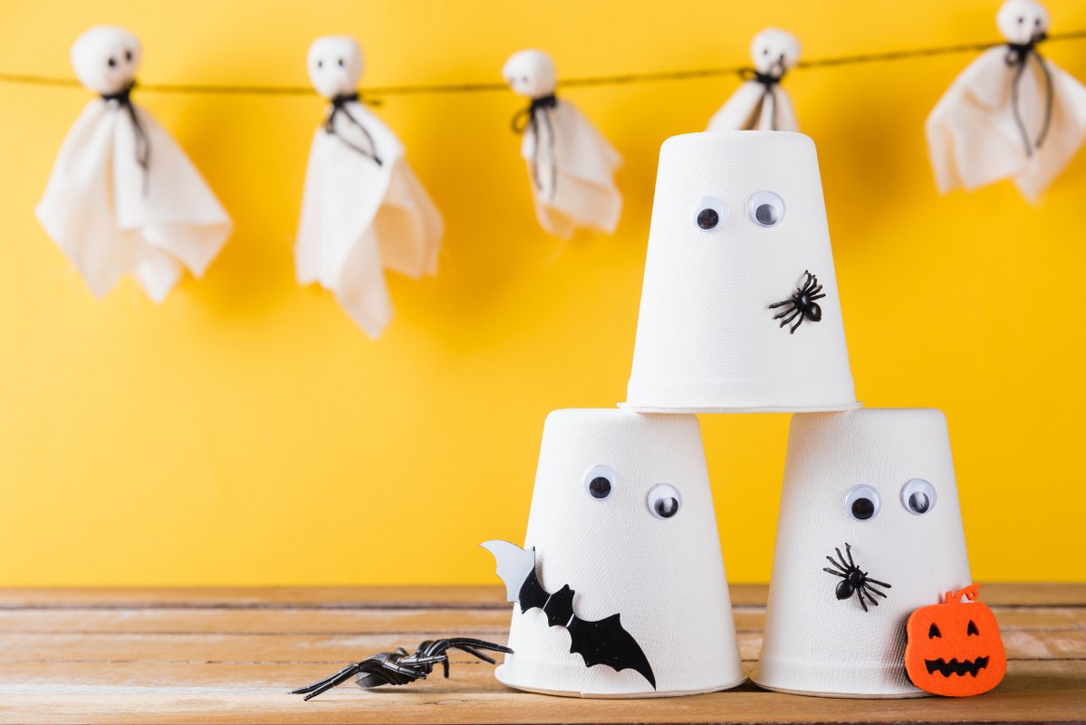 Halloween Crafts Paper Cup Ghost on Wood.