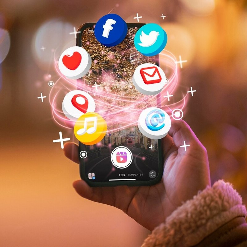 Hand holding smartphone social media concept.