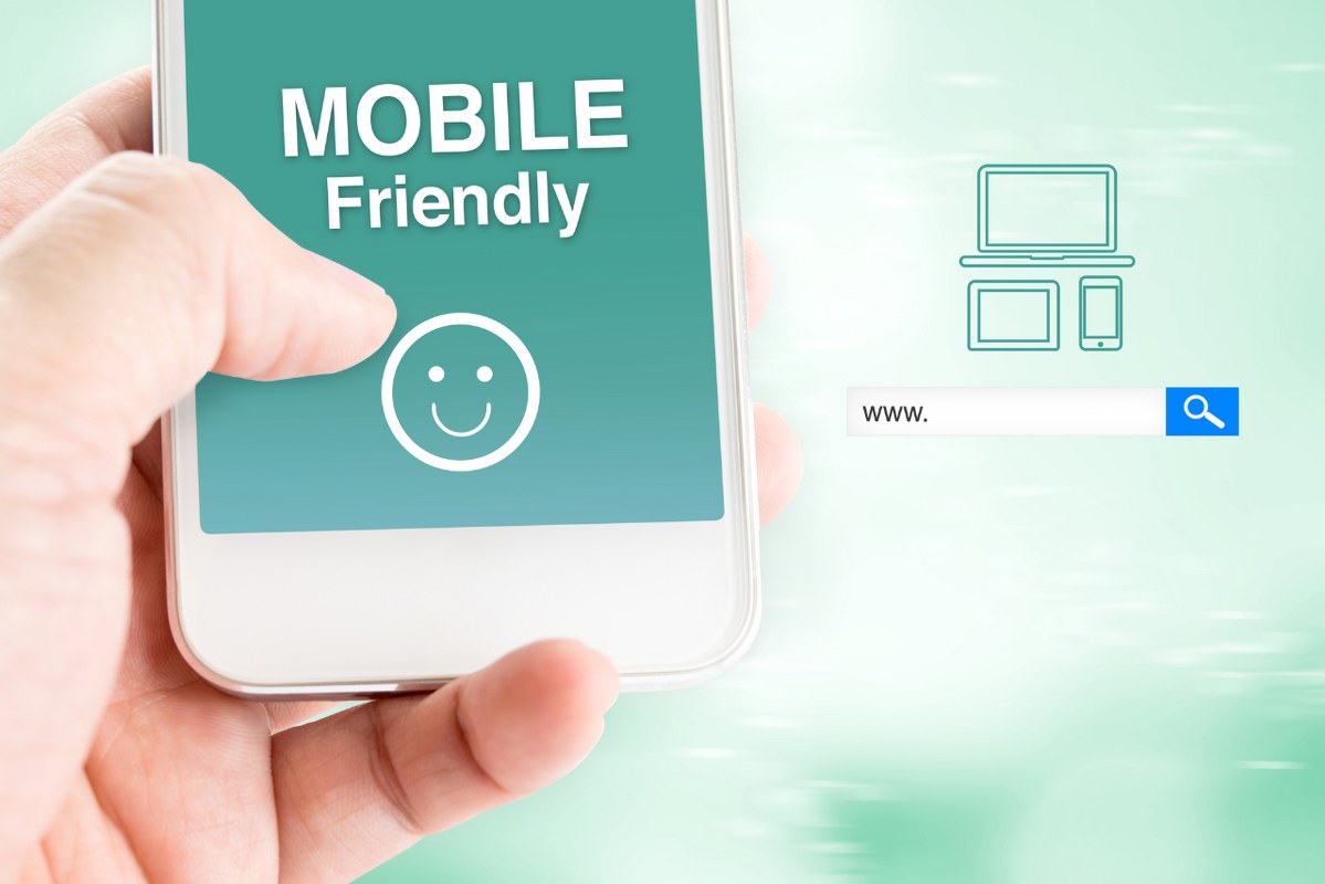 Hand touch mobile with mobile friendly word with search box.