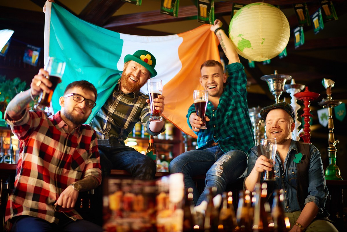Irish people celebrating St Patricks at pub.