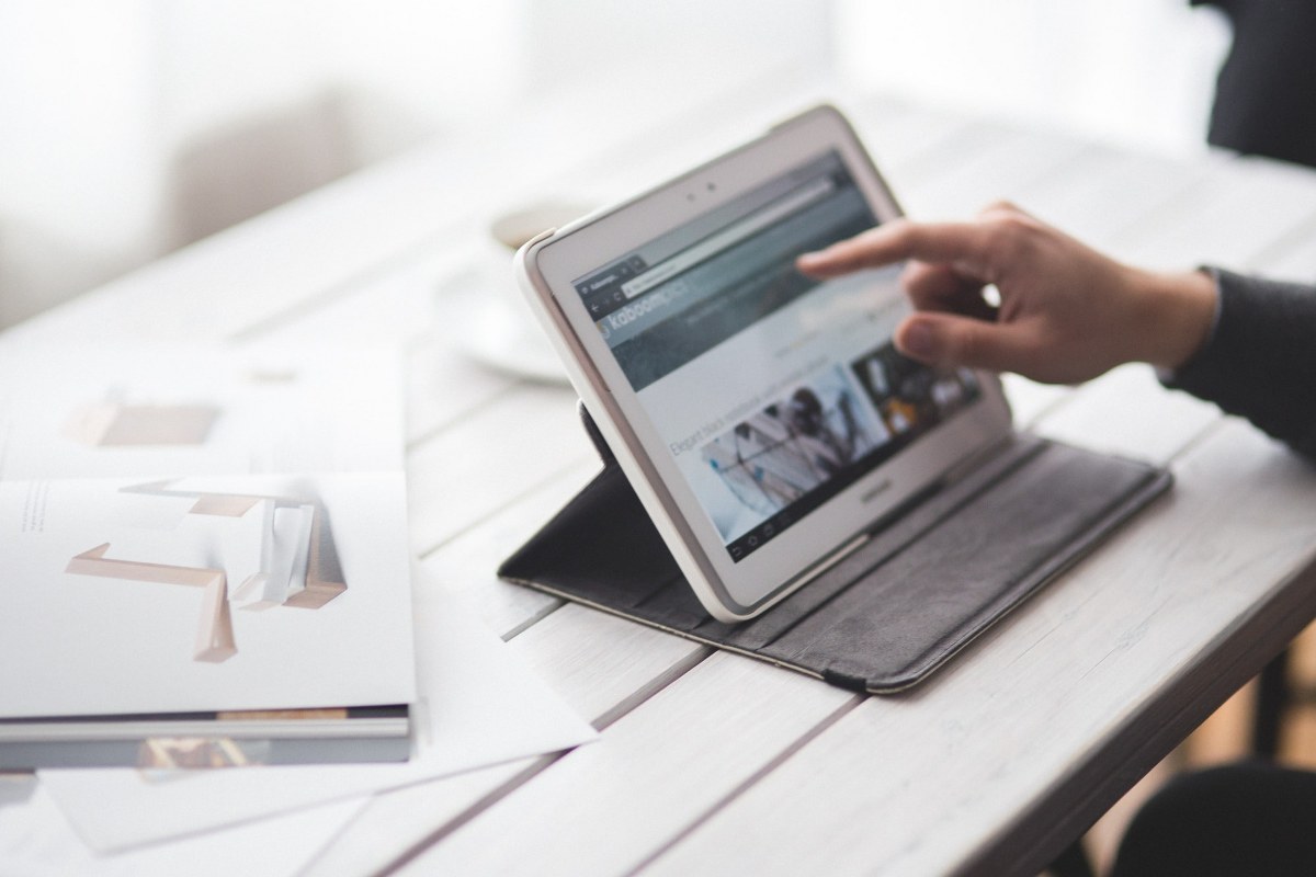 Man working with a tablet.