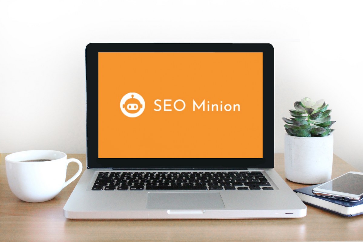 SEO Minion logo on laptop.