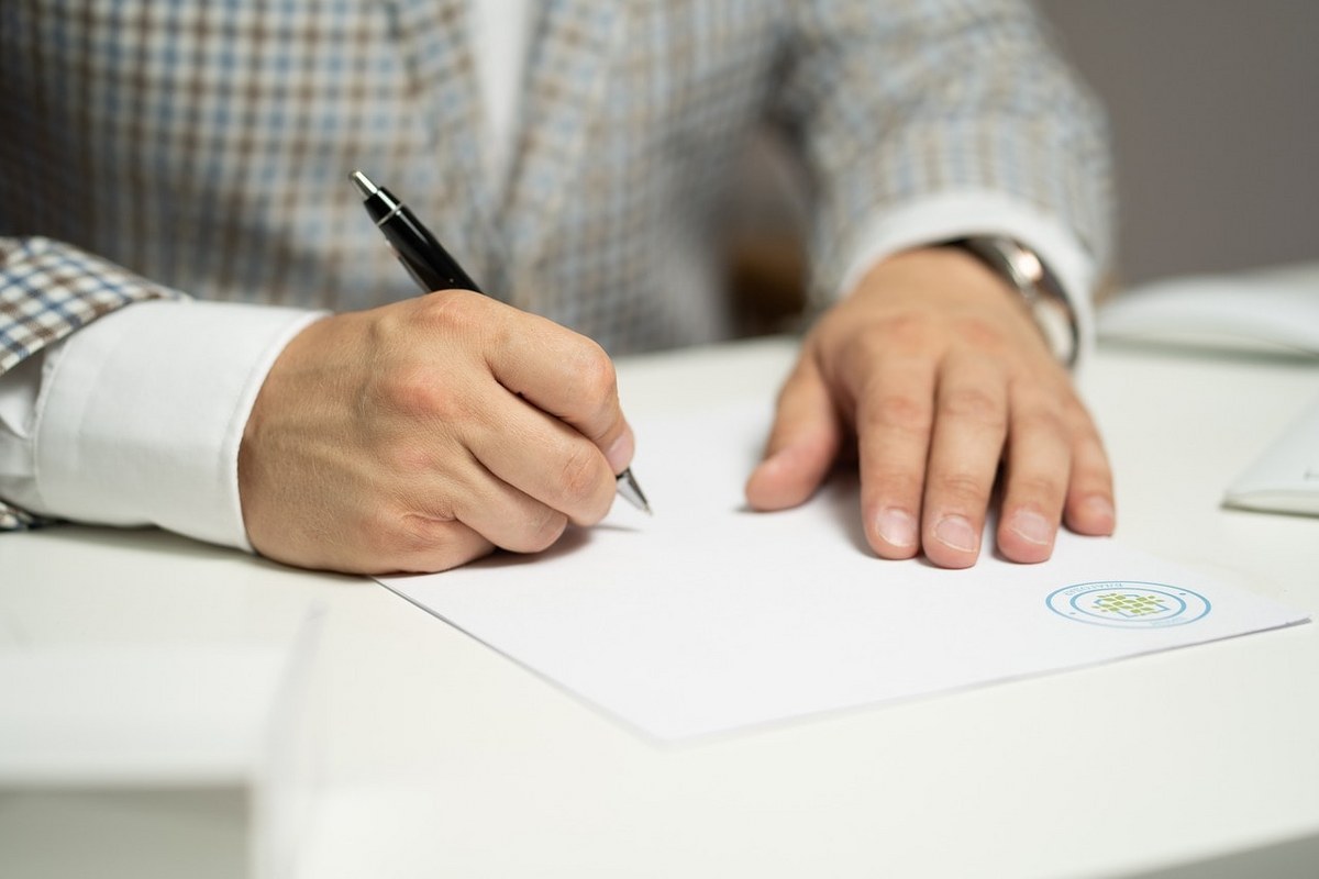 Signing legal documents.