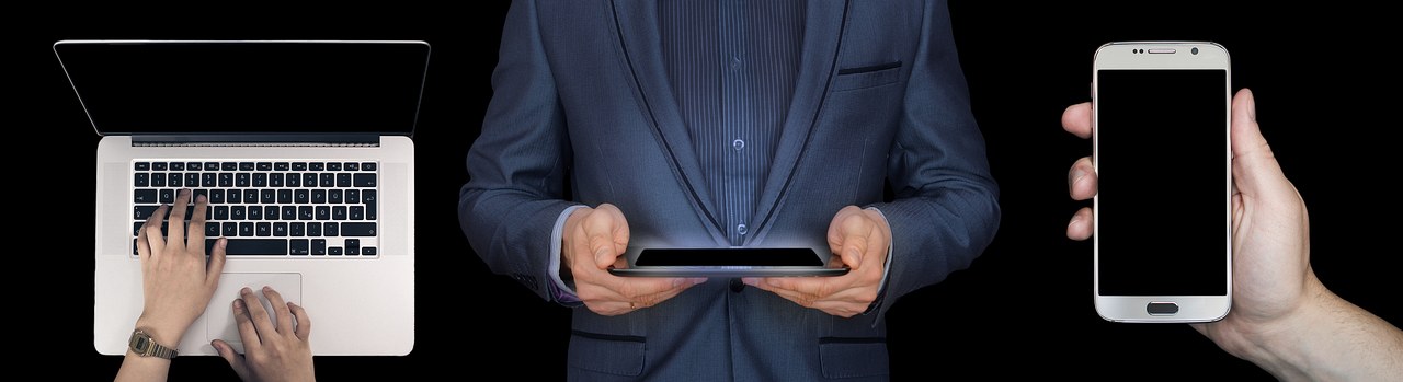 Using a laptop, a tablet and a phone.
